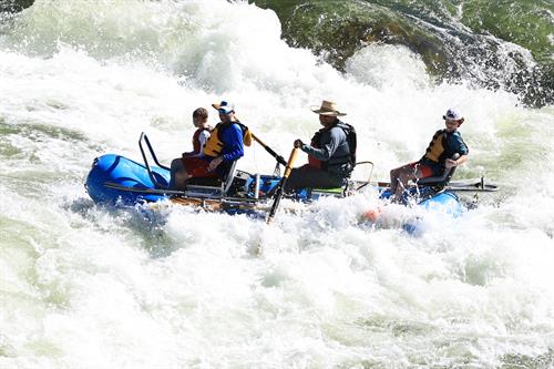 Law Enforcement Officer and his children on their first whitewater trip