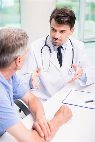 Gallery Image male-doctor-talking-with-patient-seriously-clinic.jpg
