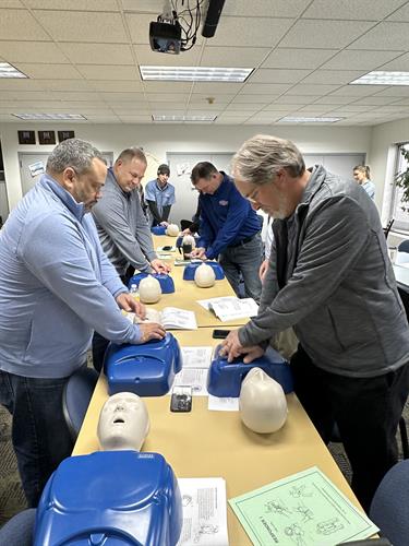Employees in CPR training