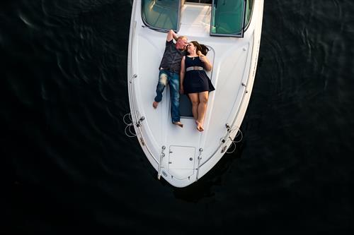 Gallery Image engagment-portrait-couple-outdoors-boat-water-lake-summer-coeurdalene-idaho.jpg