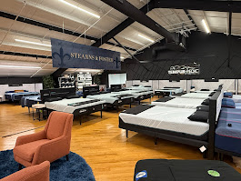 Mattress gallery featuring Sealy, Stearns & Foster, Tempur-Pedic, and Encore