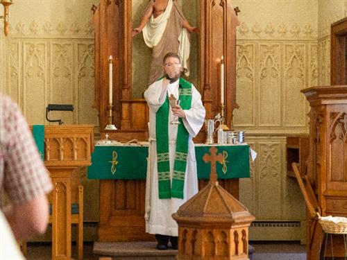 The Lord’s Supper in Lutheran worship—professional photography of Christ’s gifts in Word and Sacrament.
