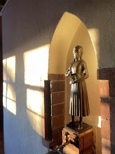 One of the three fountains at Waelderhaus. This one depicts a Girl Scout in 1930s dress.