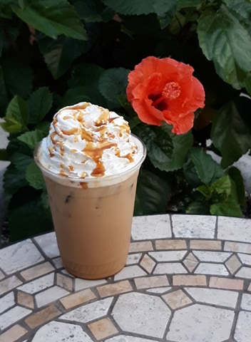 Relax on the pation with an iced latte.