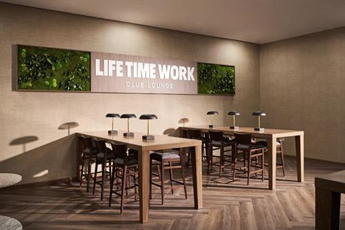 Life Time Work Club Lounge are open plan work, community-style areas inside Life Time athletic country clubs that are complimentary for all Life Time members to use — no specific Life Time Work membership required.