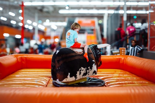 Mechanical bull experience at Big Air Plano, perfect for group events, birthday parties, and kids activities in Plano Texas