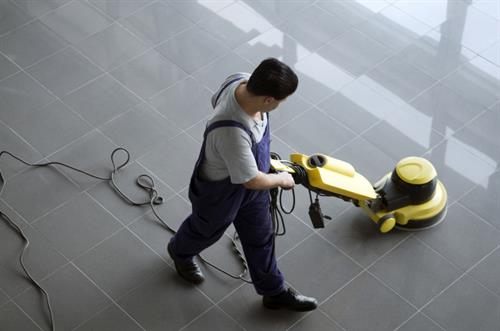 Routine commercial floor maintenance services designed to preserve cleanliness and appearance across hard surface flooring, including sweeping, mopping, and periodic floor scrubbing as part of ongoing janitorial programs.