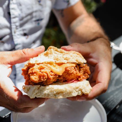 Fried chicken sandwich on a house-made ranch biscuit