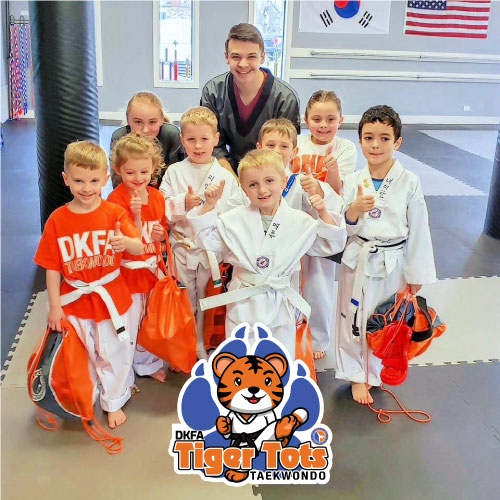 Our tots' classes are all about making fitness FUN!  In a safe and playful environment, your child will develop coordination through stretching, playful kicks & punches, and blocking exercises.