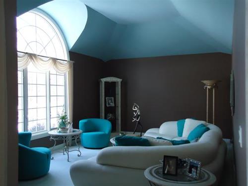 Contemporary Living Room with three color paint scheme.A mix of contemporary furniture with classical. Stunning white and turquoise furniture brought to life by deep chocolate walls and two-tone turquoise ceiling.