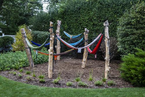Our Hammock Grove - an ICLA Excellence in Landscape Award Winner - replaced a playset with an older kid hangout. Our Hammock Grove - an ICLA Excellence in Landscape Award Winner - replaced a playset with an older kid hangout.