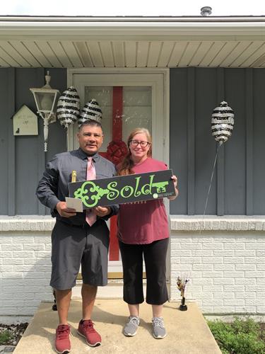 Happy clients with their new home!