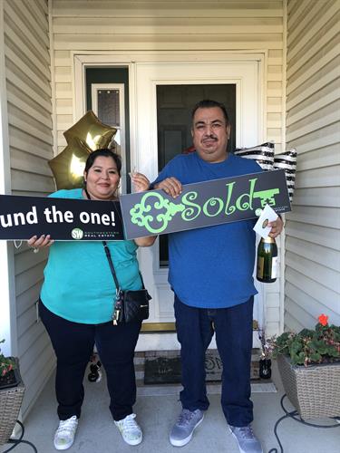 Happy clients at their new home!