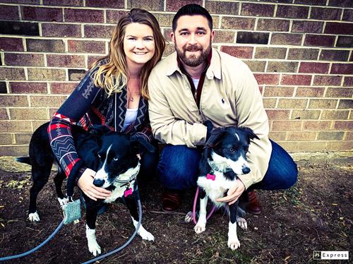 Drs. Richie & Molly with their 2 Chiropractic Pups!