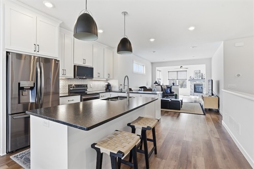 1267 Naser Way New Richmond - Derrick-built Twin Home - Kitchen and Living/Sunroom