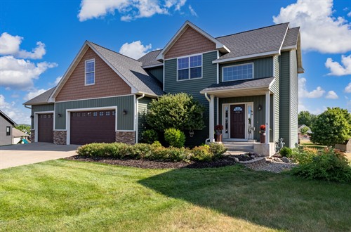Welcoming exterior of 1615 Rolling Hills Lane in River Falls
