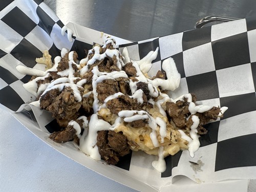 Cheesy potato bowl with Jamaican Jerk Chicken and Lime Crema