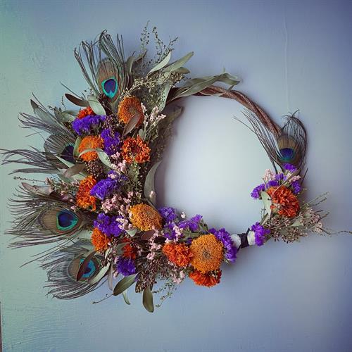 Kudzu Vine Wreath with Dried Flowers and Peacock Feathers