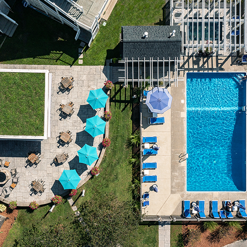 A bird's eye view of our family friendly pool and patio bar area