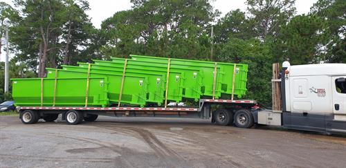 Delivery of new 30 yard dumpsters 