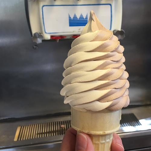 Our famous half & half soft serve ice cream cone
