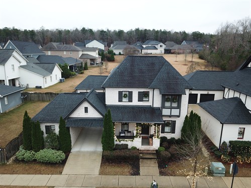 Roofing Dudes installs shingles on large roofs