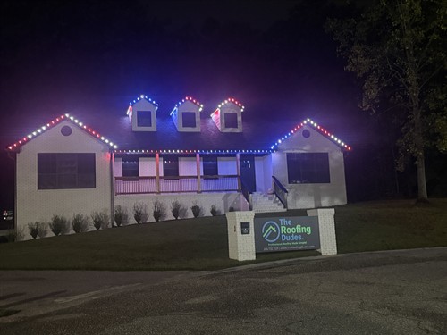 Roofing Dudes Office at night - Oelo Permanent Lighting