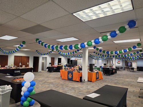 Custom ceiling balloon décor for the Sysco Food Show in Harmony, PA, created by LWP Balloon Creations.
