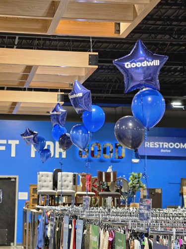 Custom helium balloon bouquets for a Goodwill grand opening, created by LWP Balloon Creations.
