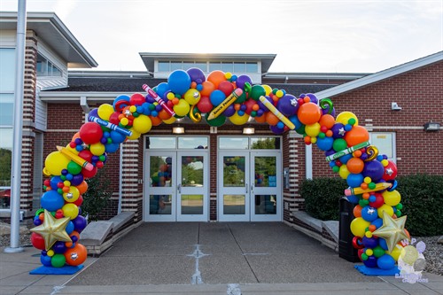 Custom balloon arch welcoming students back for the first day of school at Knoch Primary School, created by LWP Balloon Creations.