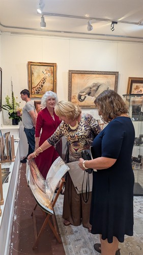 Gallery Image Kim_with_Clients.jpg