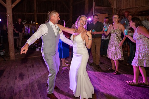 Husband and Wife on the dance floor at the their Jackson, Wisconsin, barn wedding. Steve Sweeney Photography