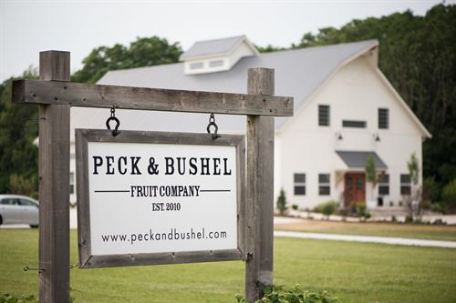 Gallery Image PeckandBushel_Sign_Barn.jpg