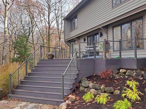 Hubertus Remodel - Timbertech PVC Decking & Deckorators Cable Railings Hubertus Remodel - Timbertech PVC Decking & Deckorators Cable Railings