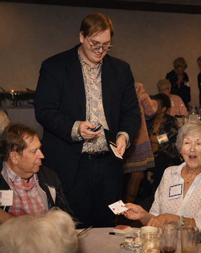 Walk-around magic at a private dinner, one table at a time