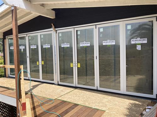 Tiburon - AG Millworks wall of bi-folds doors