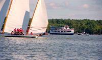 Watch the Log Canoe Races Aboard PATRIOT!
