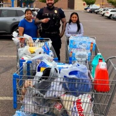 School Resourcce Officer shopped with a family in need