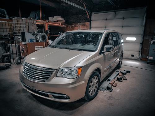 A minivan that was in the shop for an oil change