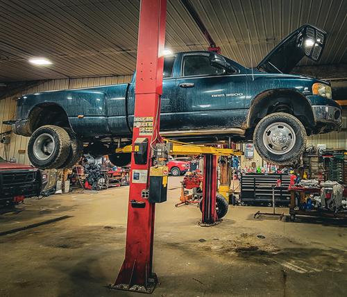 A diesel pickup truck on one of our lifts.