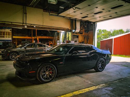 A Dodge Challenger and a Dodge Charger that were both in for routine maintenance. 