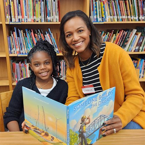 Businesses partner with us for one-day team volunteer opportunities where their employees are paired to read with one-on-one with students.