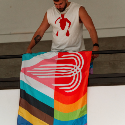 Jared Horman unveils KC Pride Flag created by him during Queer Narratives Festival 2025
