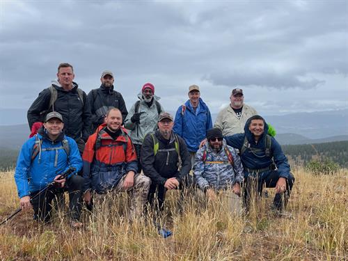 Men's Group atop Mt. Yekel on a Rainy Day.
