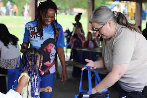 Engaging our community at that reaches beyond homelessness. At this outreach event we provided toiletry items, socks, and other necessities as kids went back to school.