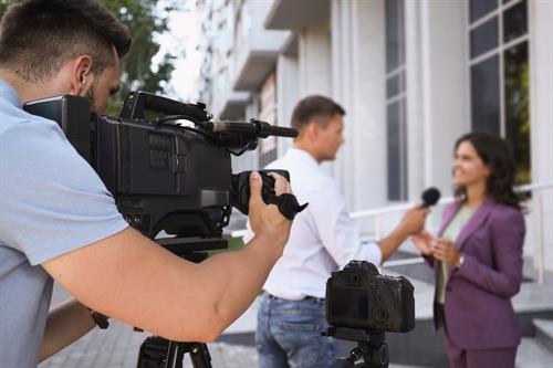 Gallery Image AdobeStock_399386694_Male_Reporter_Interviewing_Business_Woman.jpeg Gallery Image AdobeStock_399386694_Male_Reporter_Interviewing_Business_Woman.jpeg