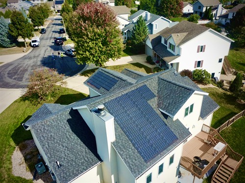 In addition to conventional asphalt roofing, Sun Vault Roofing is the only contractor in Wisconsin offering integrated solar shingle roofing systems. Solar shingles, as seen on this home on the west side of Madison, WI do not result in any penetrations through the shingle layer, leading to longer-term waterproof integrity.