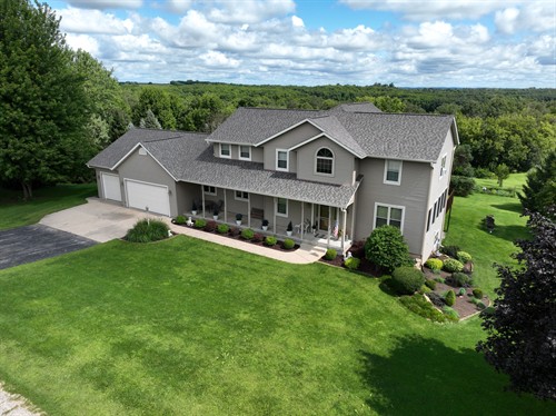 Sun Vault Roofing completed this asphalt shingle roof replacement in New Glarus, WI following a hail storm