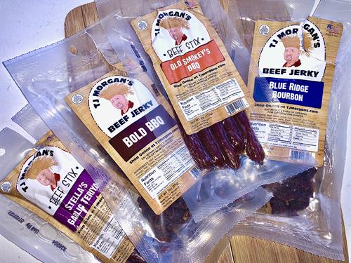 An assortment of TJ's Jerky & Beef Stix Products