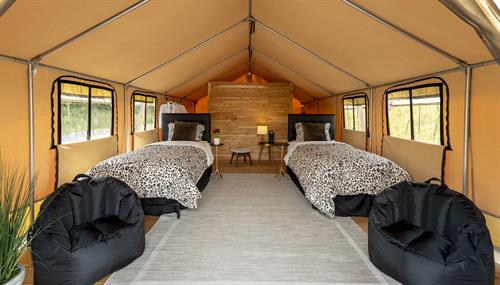 Safari tent with two twin beds and in-tent bathroom